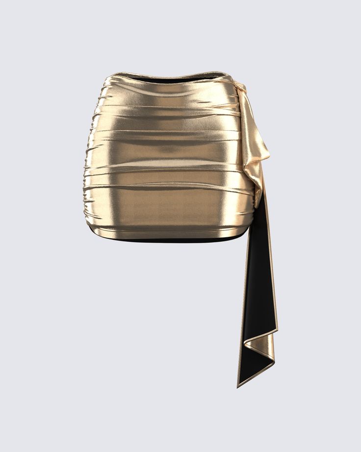 This golden drape skirt is your key to instant glam ✨ Made from lame jersey fabric, and complete with an asymmetrical hem, sash detail, ruching detail, and an elastic waistband - this skirt has a luminous allure perfect for stealing the spotlight anywhere you go 😌 Gold Concert Outfit, Golden Skirt Outfit, Gold Outfit Black Women, Golden Birthday Outfit Women, Gold Skirt Outfit, Gold Satin Skirt, Metallic Clothes, Golden Clothes, Metallic Skirts