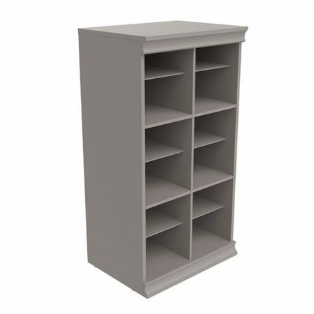 a gray bookcase with many shelves on it