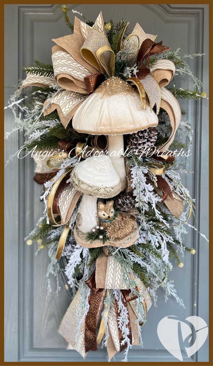 a christmas wreath on the front door with mushrooms, pine cones and other holiday decorations