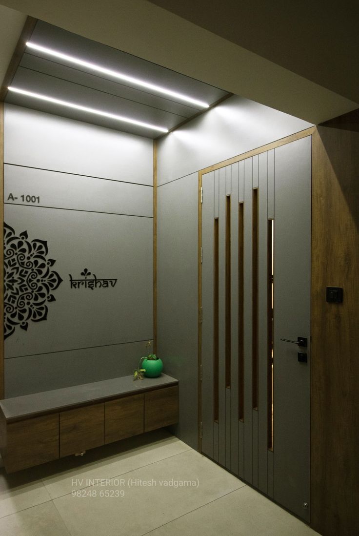 the interior of a modern office building with decorative wall decals on the walls and doors