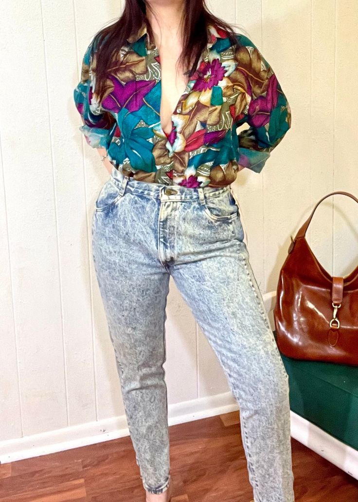 "Hello vintage lovers, thanks for stopping by! Up for sale we have another amazing & iconic pair of UNWORN 1980's vintage high waisted acid washed jeans! These are so adorable, with their high waist, tapered legs and Oh SO cute bow detail on the ankle. Excellent vintage condition with tags still attached! Snap these up before they get away! Tagged vintage size 16. Waist up to 30\", hips up to 39\". Inseam 28 Please contact us with any questions!" Acid Washed Jeans, Vintage Lovers, Acid Wash Jeans, High Waisted Mom Jeans, Hip Ups, High Waisted Jeans, Vintage Lover, 1980s Vintage, Washed Jeans