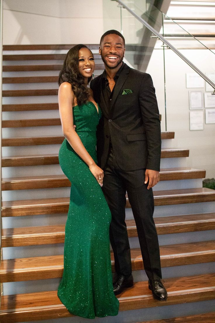 Green Dress And Black Suit Couple, Prom Guys Outfits Black, Prom Outfits For Guys Green, All Black Suit With Green Tie, Emerald Green Homecoming Couple, Green Prom Dress Black Couple, Green Prom Black Couple, Green And Black Prom Couple, Hoco Outfit Ideas For Couples