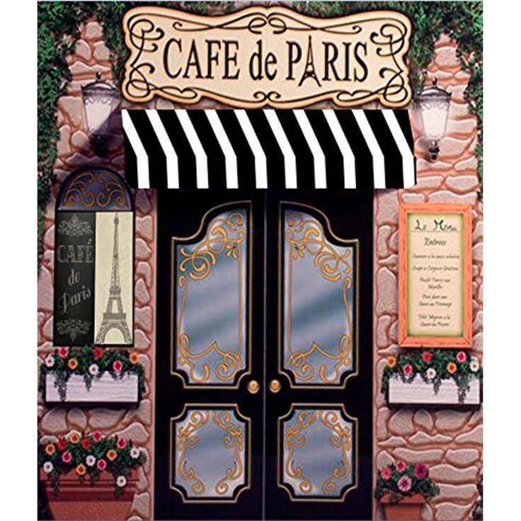 the front door to cafe de paris is decorated with black and white striped awning