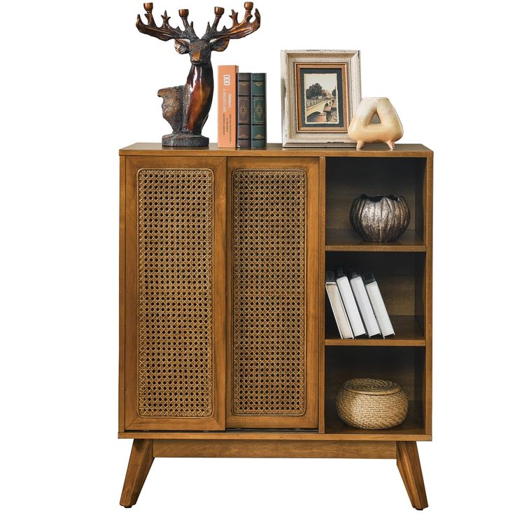 a wooden cabinet with books, vases and deer antlers on the top shelf