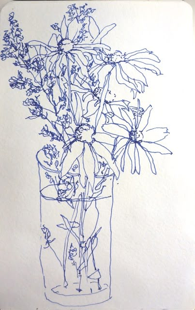 a drawing of flowers in a vase on a white paper with blue marker pen and ink