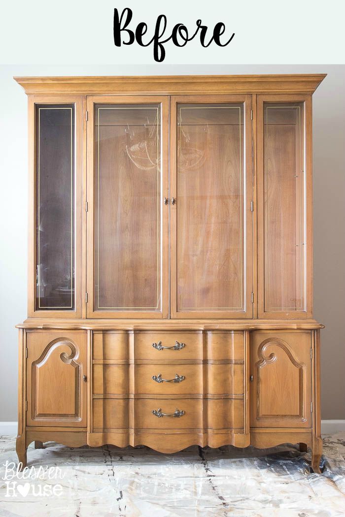 an old china cabinet with the words before painted on it