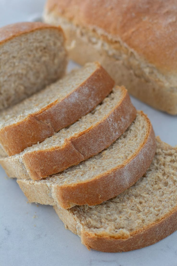 sliced bread sitting on top of a white plate