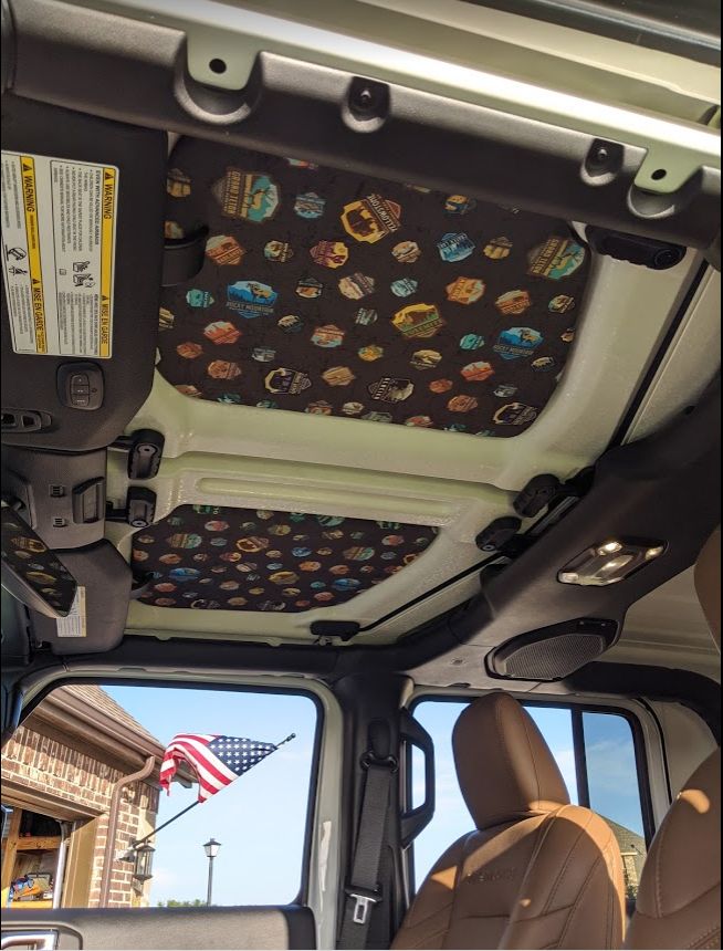 the interior of a vehicle with an american flag