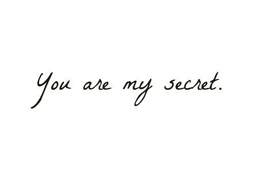 the words you are my secret written in black ink