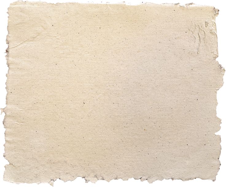 an old piece of paper that has been torn off and is sitting on a white surface