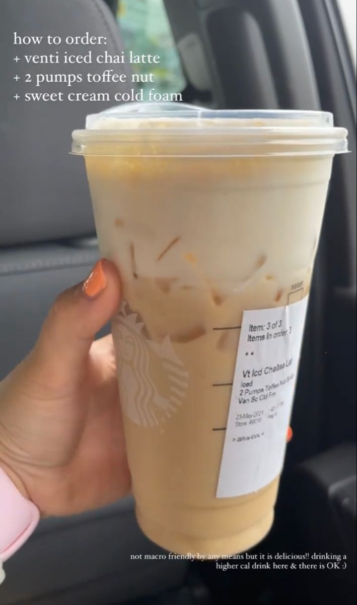 a person holding up a starbucks drink in their hand with instructions on how to order