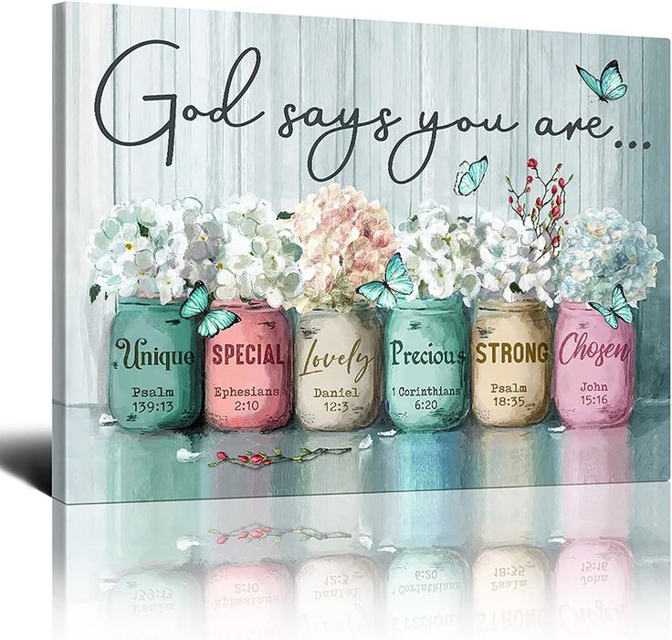 a group of painted mason jars with flowers in them and the words god says you are