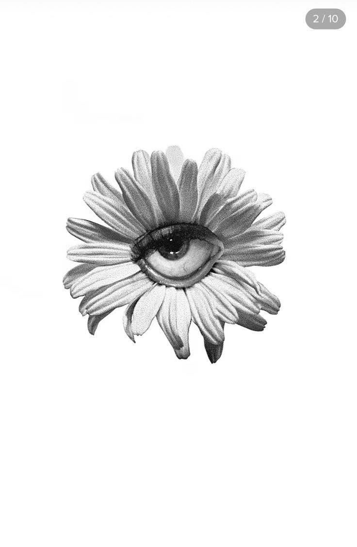 a black and white photo of a flower with an eye on it