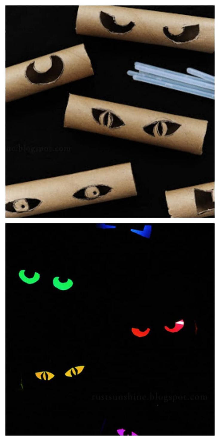 three different types of cat eyes are lit up in the dark, and one is made out of toilet paper