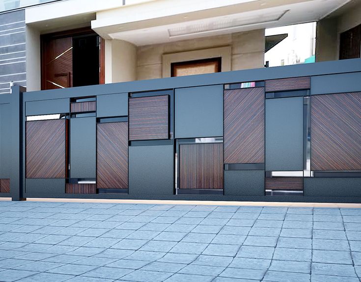 an empty parking lot in front of a building with wooden doors on the sides and windows