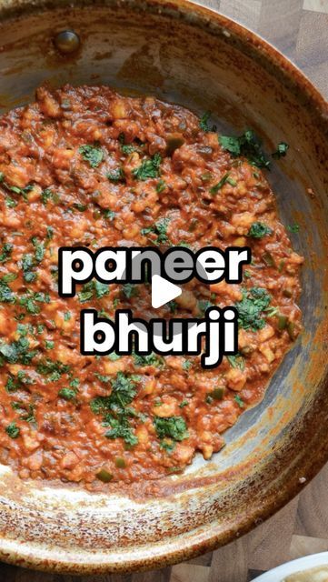 paneer bhuji in a bowl with the words paneer bhuji above it