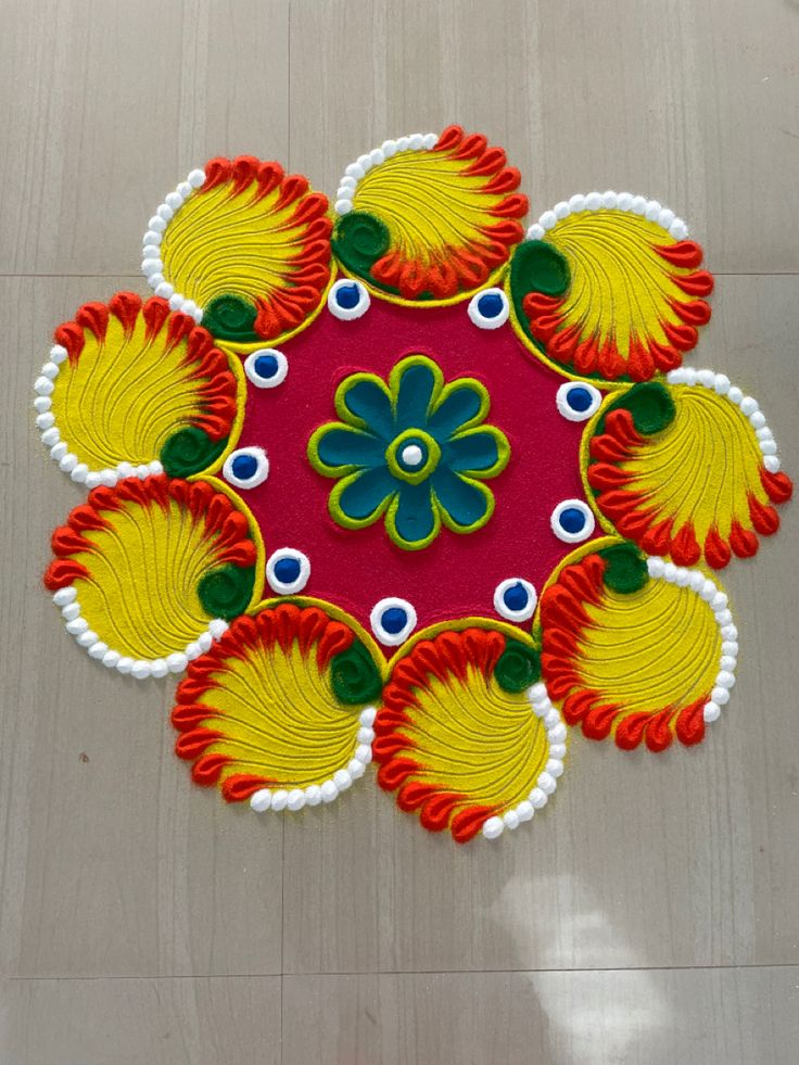 an image of a colorful flower design on the floor