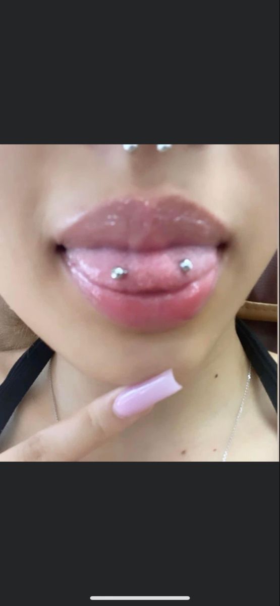 a woman's lips and tongue are shown with the words, what do you think?