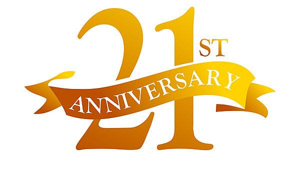 the 21st anniversary logo is shown with an orange ribbon and gold lettering that reads, st