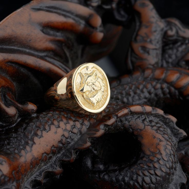 Discover the elegance of our Gold Wolf Ring, designed to add a touch of style to your everyday look. This meticulously handcrafted gold ring boasts intricate engraving details that are not only visually striking but also meaningful. With its high-quality craftsmanship, this ring is not just a piece of jewelry; it's a legacy you can pass down to generations, symbolizing both your exquisite taste and your family's enduring heritage for more rings :   https://marylebonesilver.etsy.com MATERIALS: - Gold Ring For Men, Ring For Boyfriend, Intricate Rings, Fantasy Ring, Wolf Ring, Rings Promise, Silver Chain For Men, Signet Ring Men, Mens Gold Rings