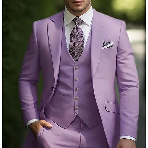 a man wearing a purple suit and tie