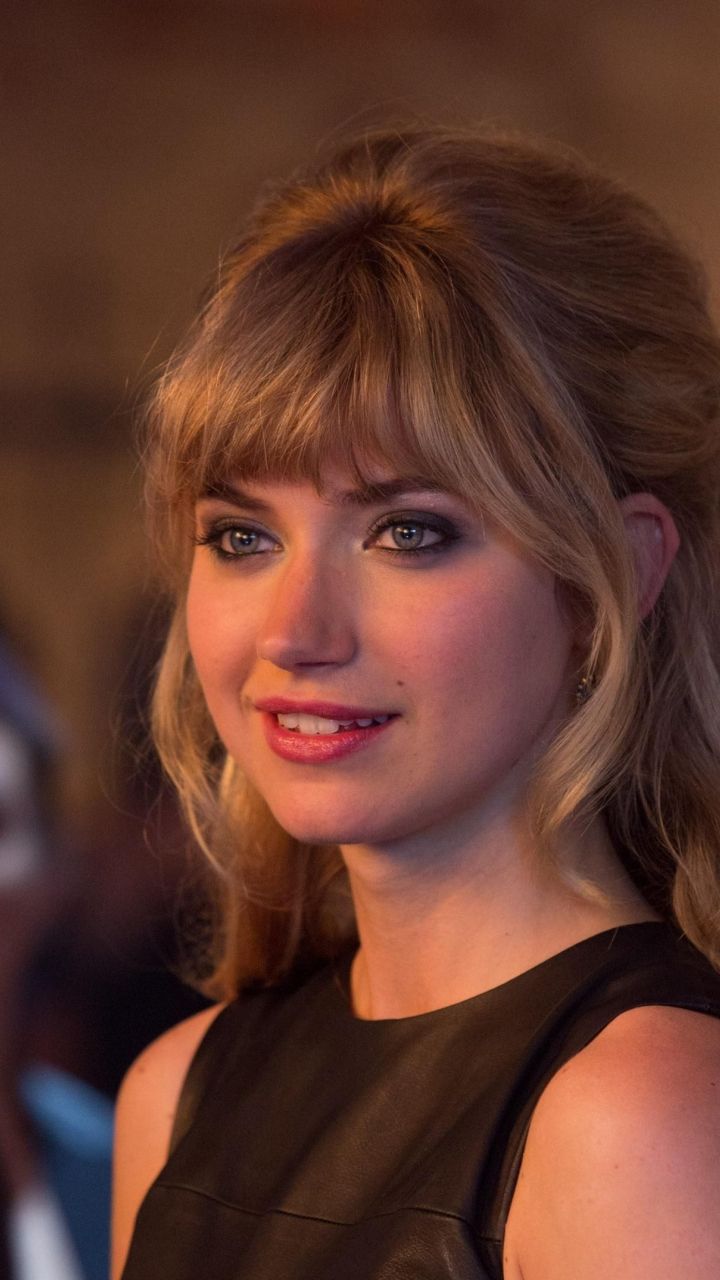 a close up of a person wearing a black dress