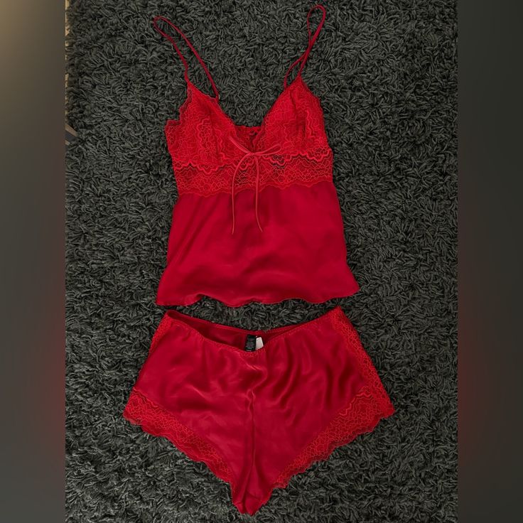 Never Worn With Tags Still Attached! Gorgeous Red 2-Piece Sleep Set From Victoria’s Secret. Non-Stretch Material. Adjustable Straps On The Top To Tighten Or Loosen. 3 Buttons On The Back Of The Top To Open Up The Back. The Shorts Have An Elastic Waistband To Stretch To Your Hips. I Always Wash And Clean Clothes Before Shipping Them Out To Their New Home Red V-neck Loungewear Set, Red Lounging Sets For Summer, Red Summer Sets For Bedtime, Red Bedtime Sets For Summer, Red Camisole Sleepwear For Loungewear, Red Camisole Sleepwear For Night, Red Summer Sleepwear For Night, Red Lace Trim Sleepwear For Summer, Red Camisole Sleepwear For Bedtime