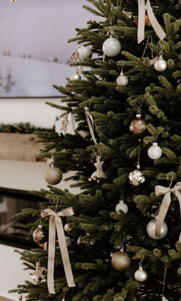 a christmas tree with ornaments hanging from it