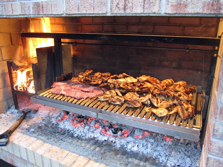 there are many meats cooking on the grill in the oven and it looks like they're ready to be cooked