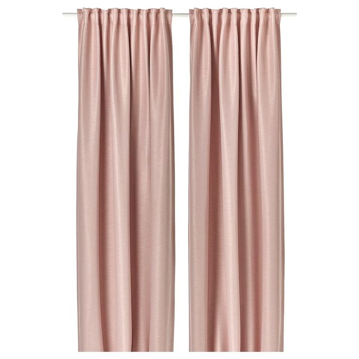 two pink curtains hanging on the side of a window