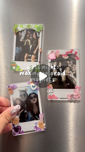 someone is holding up some pictures to show them on the refrigerator door with their thumbnails