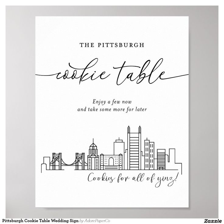 the pittsburgh skyline table sign is shown in black and white, with an artistic calligraphy font