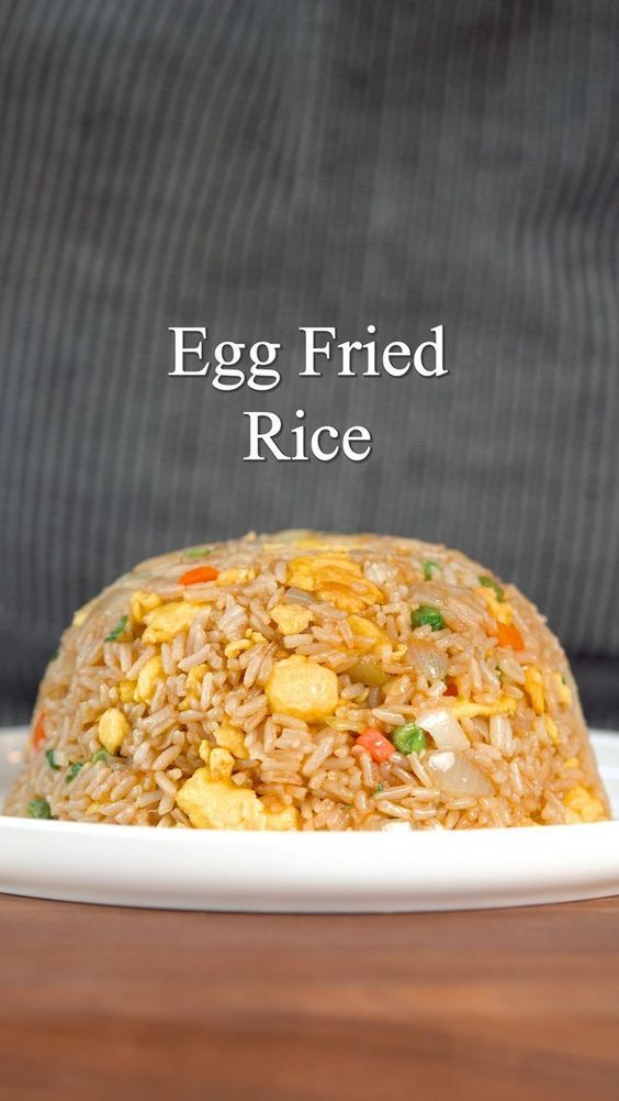 an egg fried rice dish on a white plate