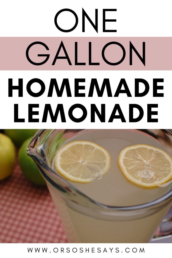 a pitcher filled with lemonade sitting on top of a table