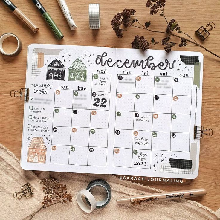 a calendar with the words december written on it next to some scissors and other items