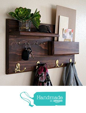 the coat rack is made out of wood and has hooks on it, along with other items