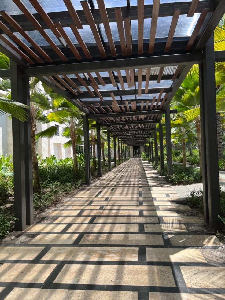 the walkway is lined with wooden slats