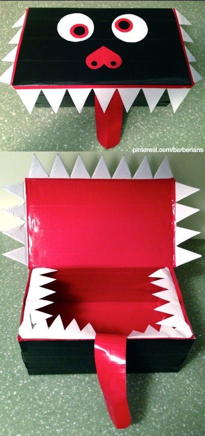 an open box that has been decorated to look like a monster