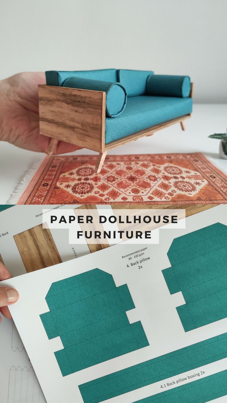 paper dollhouse furniture is displayed on a table