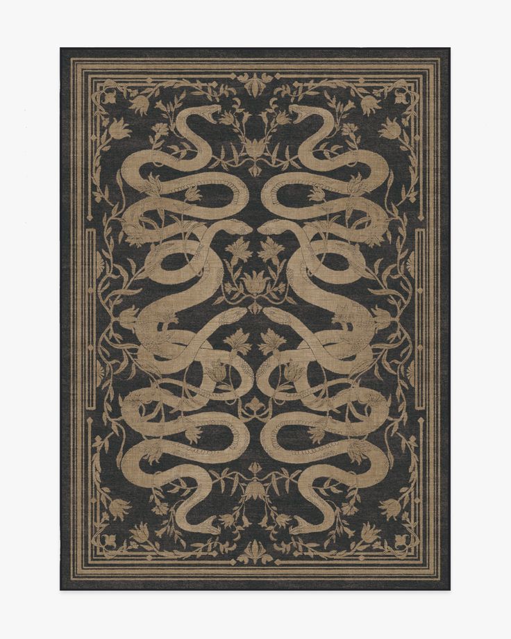 an intricately designed book cover with snakes on black and tan paper, in the shape of a rectangle