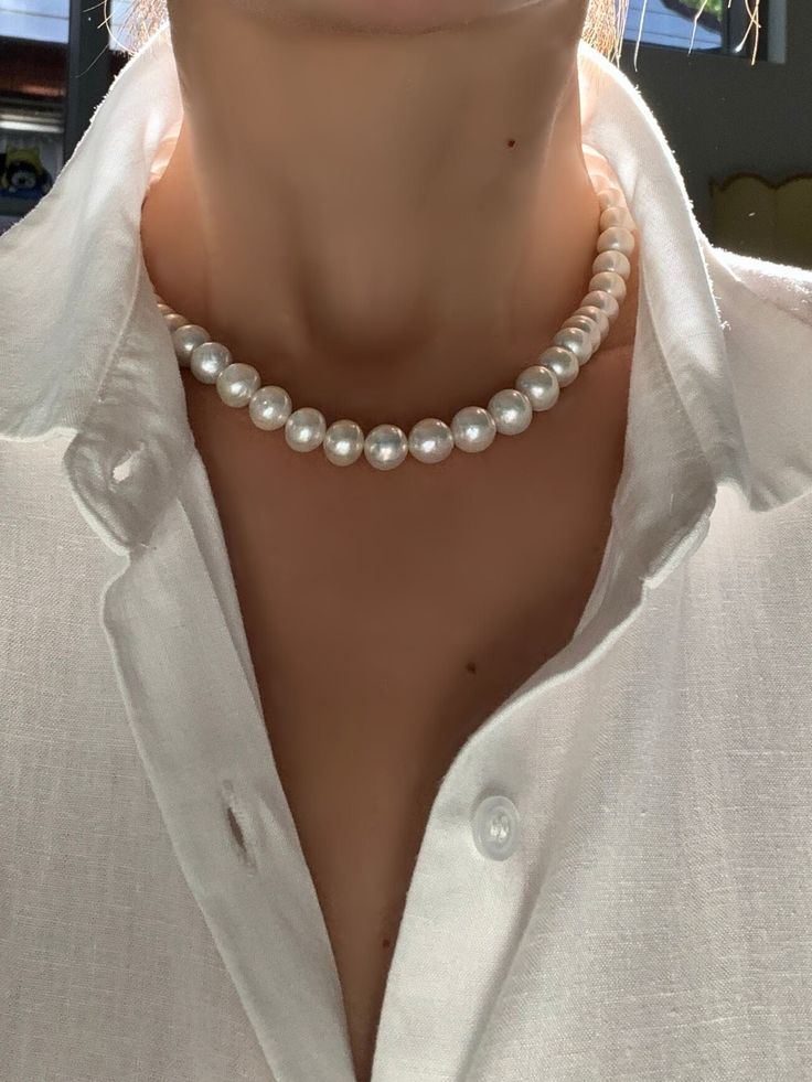 Welcome to AmberLirong!  ---------------------------------- Pearl type: Genuine White South Sea pearl, Excellent Luster, handmade The videoed and photoed product is the one you will take home. Pendant is not included ✨ Elevate Your Elegance with Our South Sea White Pearl Necklace! ✨ Discover the timeless beauty of our South Sea White Pearl Necklace, featuring pearls sized between 9mm to 10mm. Renowned for their superb luster, these pearls are perfectly versatile, making them ideal for both daily Luxury Silver Bridal Necklace With Pearl Charm, Luxury Round Pearl Necklace With Pendant, Luxury Pearl Necklace With Diamond Accents For Gifts, White Pearl Necklace Outfit, Luxury Double Strand Pearl Drop Necklace, Luxury Refined Pearl Necklace With Pearl Charm, Affordable Sterling Silver Pearl Necklace Gift, Classy Pearl Necklace, Classic White Handmade Necklace