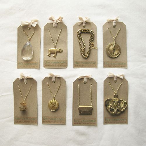 six tags with different types of necklaces on them