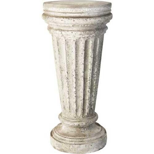 an old white pedestal is shown against a white background with the top part of it's column visible