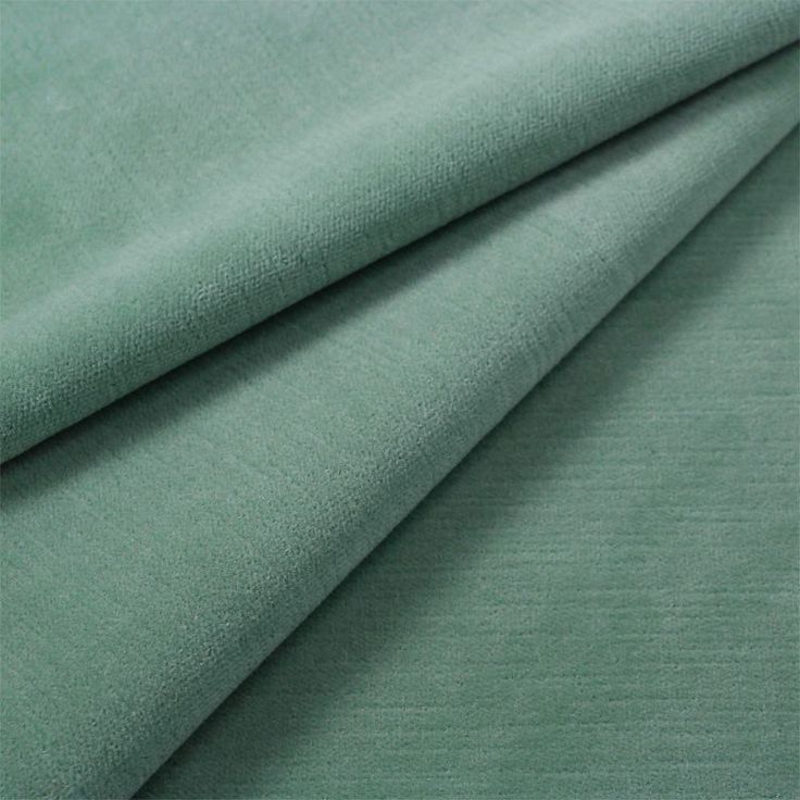 the fabric is light green and has a very thin pattern