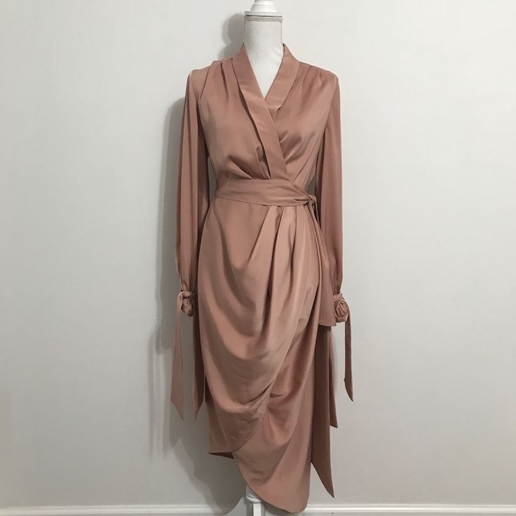 C/Meo Collective Long Sleeve Wrap Dress In Dusty Pink Featuring Elegant Draping And Long Ties At Each Sleeve. About This Closet: Each Item Is From My Current, Personal Wardrobe And Is Well Cared For, Cherished And Gently Pre-Loved! The Price Listed Is The Lowest Price I'm Willing To Give It Up For. For This Reason, I Do Not Consider Offers. If You Love It, Click Buy Now To Make It Yours! Pre-draped Long Sleeve Evening Midi Dress, Evening Pre-draped Long Sleeve Midi Dress, Beige Draped Formal Dress, Elegant Beige Draped Midi Dress, Chic Draped Midi Dress For Fall, Chic Long Sleeve Wrap Dress For Brunch, Feminine Midi Dress With Surplice Neckline For Evening, Feminine Midi-length Wrap Dress For Party, Feminine Midi Wrap Dress For Party