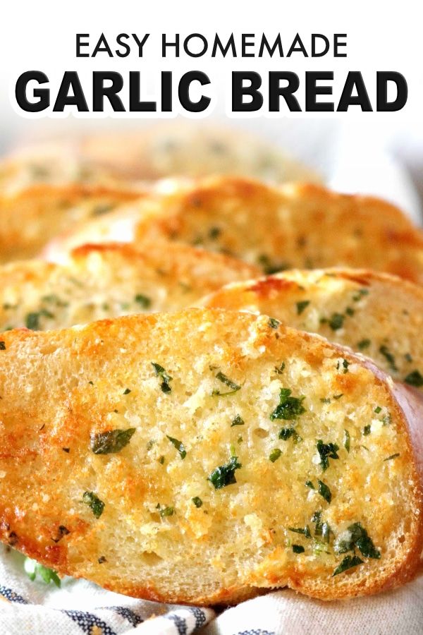 homemade garlic bread on a towel with text overlay