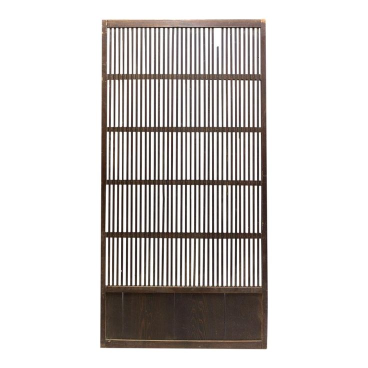 a wooden screen with metal bars on the top and bottom, against a white background