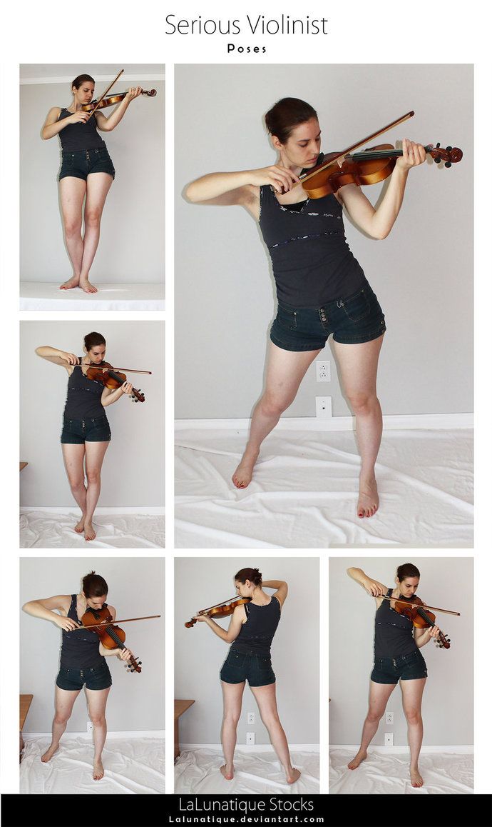 a woman is playing the violin and posing for pictures