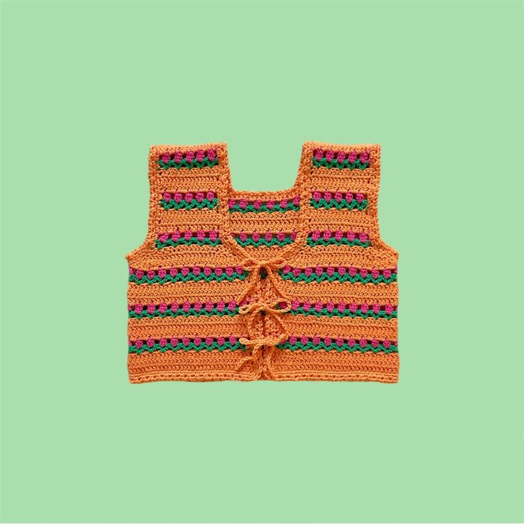 Handmade Orange, Pink, & Green Crochet Floral Vest. Has A Really Cute Tulip Flower Striped Design, Comes With Removable Front Ties, Fits Cropped On Most Bodies. 100% Cotton. Handmade By Myself. Condition: 10/10 Measurements Taken Laying Flat: Pit To Pit - 18.5” Length - 16” Floral Vest, Floral Vests, Green Crochet, Tulip Flower, Cropped Vest, Tulips Flowers, Orange Pink, Stripes Design, Handmade Crochet