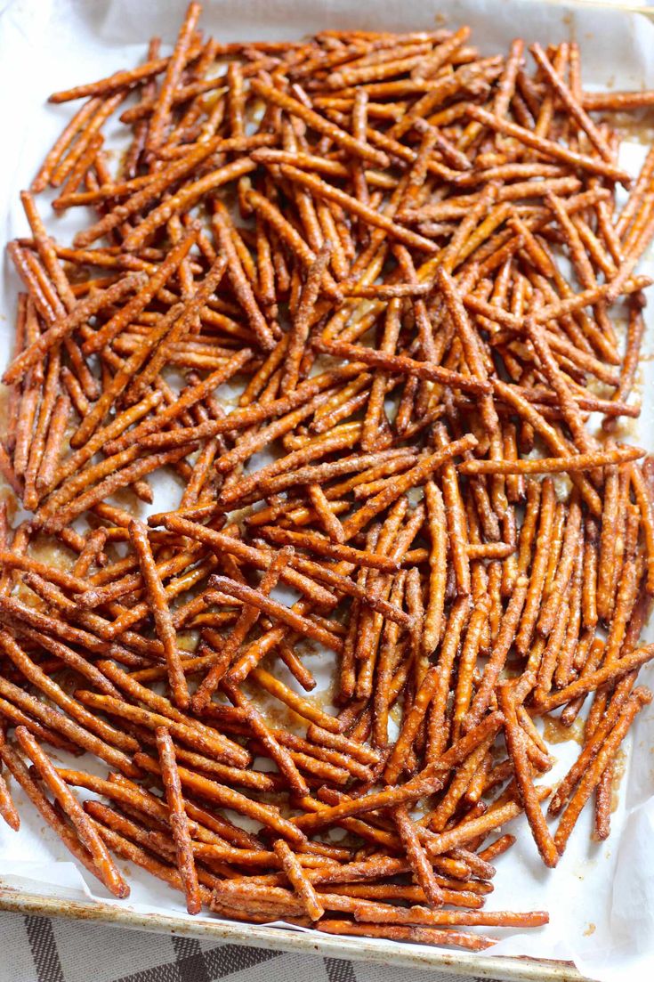 sweet potato sticks on a baking sheet ready to be baked in the oven or used as appetizer